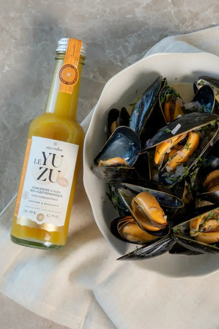 Une recette de moules au yuzu réalisées par Alexia Duchêne, cheffe française
